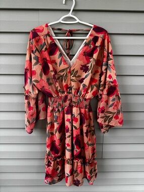 Floral V-Neck Smocked Mini Dress in Peach/Coral